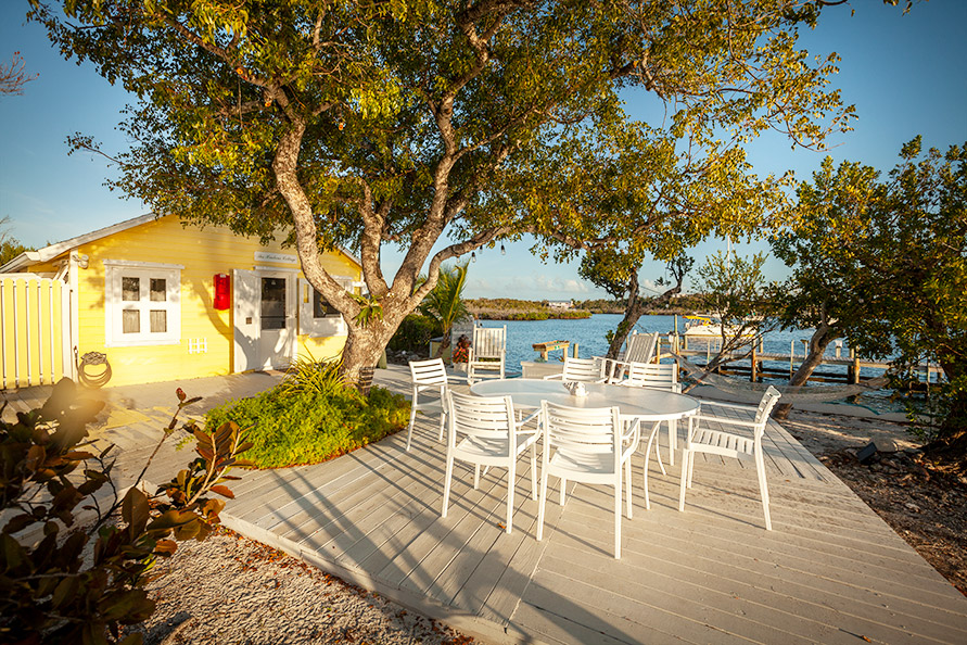 Beautiful setting for outdoor dining on the expansive deck surrounding the Harbour Cottage on Black Sound.