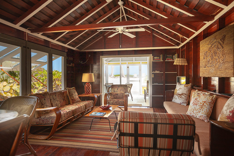 Main living area and sitting room with round table for dining.