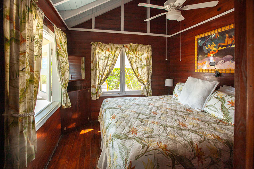 Front bedroom with king-size bed and view of the Atlantic Ocean.